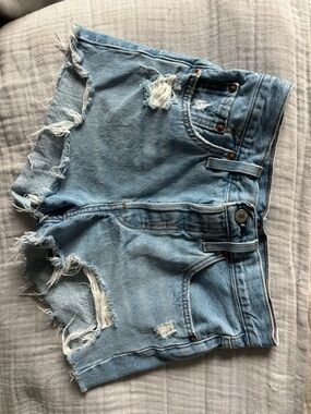 Levi’s 501 Light Blue Distressed Denim Shorts